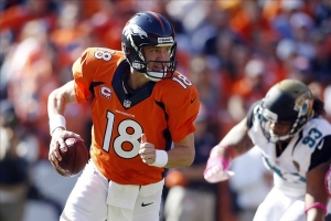 Manning could set records against the Colt's defense Sunday night. <br/>Chris Humphreys-USA TODAY Sports