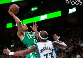 Boston Celtics' Avery Bradley, left, takes a shot on net as Minnesota Timberwolves' Dante Cunningham defends during the second quarter of an NBA preseason basketball game in Montreal, Sunday, Oct. 20, 2013. (AP Photo/The Canadian Press, Graham Hughes) <br/>