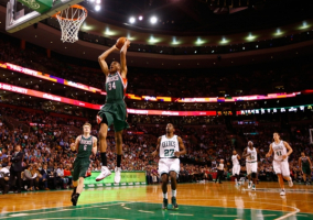 Bucks rookie Giannis Antetokounmpo throws down a fastbreak jam in Boston. Giannis saw 12 minutes of action and scored five points on 2-5 shooting. Jared Wickerham / Getty Images / NBAE <br/>