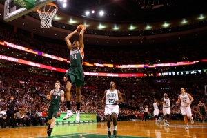 Bucks rookie Giannis Antetokounmpo throws down a fastbreak jam in Boston. Giannis saw 12 minutes of action and scored five points on 2-5 shooting. Jared Wickerham / Getty Images / NBAE <br/>