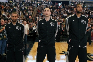 Apr 17, 2013; San Antonio, TX, USA; San Antonio Spurs guard Tony Parker (left), and Manu Ginobili (center), and forward Tim Duncan (right) during the national anthem against the Minnesota Timberwolves at the AT&T Center. Soobum Im-USA TODAY Sports <br/>