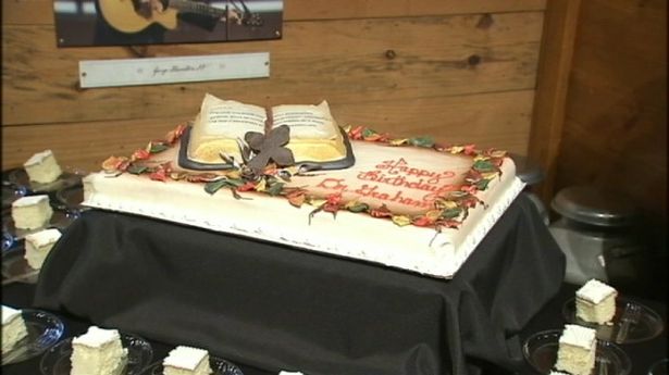 The birthday cake is decorated with a Bible and a cross. ( Photo: WSOCTV.com)