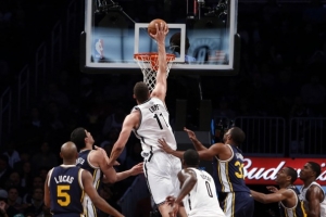 Brooklyn Nets' Brook Lopez (11) dunks against the Utah Jazz during the first half of the game on November 5, 2013 in New York.  <br/>