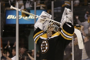 Boston Bruins goalie Tuukka Rask celebrates as the his team defeats the Pittsburgh Penguins in double overtime in Game 3 of their NHL Eastern Conference finals hockey playoff series in Boston, Massachusetts, June 5, 2013.  <br/>REUTERS/Winslow Townson