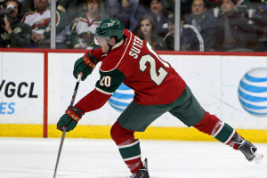 Minnesota Wild defenseman Ryan Suter skates with the puck during the second period against the Calgary Flames on Tuesday at Xcel Energy Center in St. Paul. Reuters <br/>Reuters