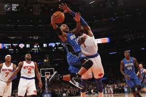 Orlando Magic's Nelson drives to basket past New York Knicks' Stoudemire during their NBA basketball game in New York. <br/>ADAM HUNGER/REUTERS