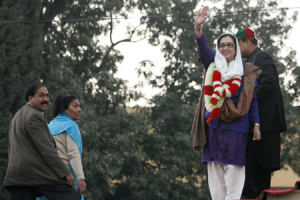 Pakistan's former Prime Minister Benazir Bhutto waves good-bye to supporters after attending her last rally at Liaquat Bagh in Rawalpindi, Pakistan, Thursday, Dec. 27, 2007. Opposition leader Bhutto was assassinated Thursday in a suicide attack that also killed at least 20 others at a campaign rally, aides said. <br/>(Photo: AP Images / B.K.Bangash)
