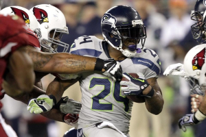 Seattle Seahawks running back Marshawn Lynch (24) runs against the Arizona Cardinals during the first half of an NFL football game, Thursday, Oct. 17, 2013, in Glendale, Ariz. (AP Photo/Rick Scuter) <br/>