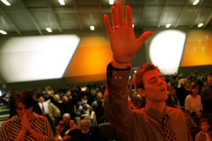 Aaron Kruse, a New Life Church member, worships during services Sunday, Feb., 18, 2007, in Colorado Springs, Colo. <br/>(Photo: AP Images / Nathan W. Ames, Pool)