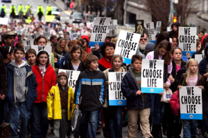 GRTL walking in a rally during Martin Luther King, Jr. Day. <br/>Photo by Jason Getz
