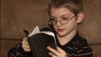 Jason Cross, 8, of Dearborn Heights, Mich., was banned from bringing Bible school to read during free time. Mother says the teachers at the same school distributed worksheets referencing alcohol. (Photo: Fox News) <br/>