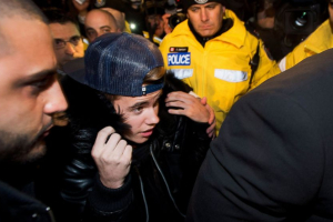 Singer Justin Bieber turns himself in to Canadian Police for assault charges. <br/>