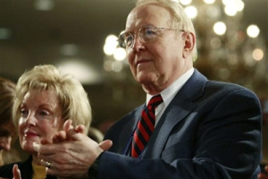 Christian evangelical leader James Dobson, right, and his wife Shirley, stand and applaud as President Bush, not pictured, addresses the National Religious Broadcasters 2008 Convention, Tuesday, March 11, 2008, at the Gaylord Opryland Resort and Convention Center in Nashville, Tenn. <br/>(Photo: AP Images / Charles Dharapak) 