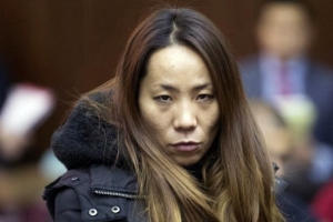 Hajoung 'Dada' Heath, 40, appears in criminal court in New York January 30, 2014. She was charged with drug offenses and promoting prostitution in relation to selling 'party packs' of cocaine and sex to clients. A multimillion-dollar New York City drug and prostitution ring has been busted, law enforcement officials said on Thursday, as they warned Super Bowl fans to steer clear of the city's sex and narcotics underworld. REUTERS/Steven Hirsch/Pool <br/>