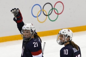 USA's Hilary Knight (L) waves next to teammate Meghan Duggan as they leave the ice after defeating Finland during their women's preliminary round hockey game at the Sochi 2014 Winter Olympic Games February 8, 2014. (Photo: Reuters) <br/>