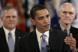 Democratic presidential hopeful Sen. Barack Obama, D-Ill., speaks during a press conference with Major General Scott Gration, U.S. Air Force, left, General Merrill McPeak, U.S. Air Force, and other military leaders from the United States armed forces Wednesday, March 12, 2008 in Chicago. <br/>(Photo: AP Images / M. Spencer Green) 