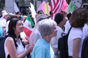 An Asian protestor in the crowd of Mexicans. <br/>Photo: Gospel Herald/ Hudson Tsuei