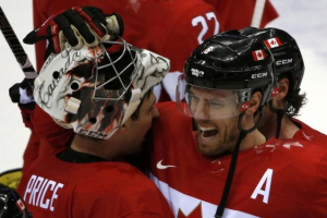 Canada's Shea Weber (R) celebrates with goalie Carey Price after Canada won their men's ice hockey semi-final game against Team USA at the 2014 Sochi Winter Olympic Games, February 21, 2014.<br />
CREDIT: REUTERS/GRIGORY DUKOR <br/>