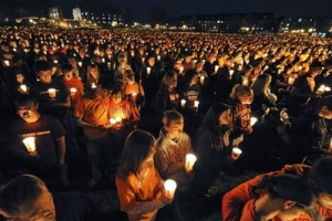 Students and mourners hold candles during a candle light ceremony marking the first anniversary of the April 16 2007 shootings on the campus of Virginia Tech in Blacksburg, Va., Wednesday, April 16, 2008. <br/>(Photo: AP Images / Don Petersen) 