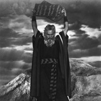 In this 1955 file photo Charlton Heston in charecter as Moses in 'The Ten Commandments.' Heston, who won the 1959 best actor Oscar as the chariot-racing 'Ben-Hur' and portrayed Moses, Michelangelo, El Cid and other heroic figures in movie epics of the '50s and '60s, has died. He was 84. <br/>(Photo: AP Images / American Movie Classics, File)