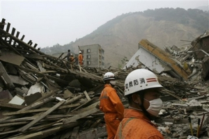 Rescuers search for earthquake survivors in Beichuan county, southwest China's Sichuan province, China, Saturday, May 17, 2008. <br/>(Photo: AP Images / Vincent Yu)