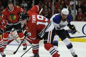 Apr 21, 2014; Chicago, IL, USA; Chicago Blackhawks center Jonathan Toews (19) and St. Louis Blues center Steve Ott (29) fight for the puck during the first period in game three of the first round of the 2014 Stanley Cup Playoffs at the United Center.  (Photo: David Banks-USA TODAY Sports) <br/>