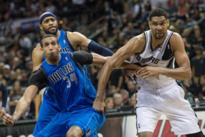 Apr 20, 2014; San Antonio, TX, USA; Dallas Mavericks forward Brandan Wright (34) and San Antonio Spurs forward Tim Duncan (21) fight for position during the second half in game one during the first round of the 2014 NBA Playoffs at AT&T Center. The Spurs defeated the Mavericks 90-85. Mandatory Credit: Jerome Miron-USA TODAY Sports <br/>