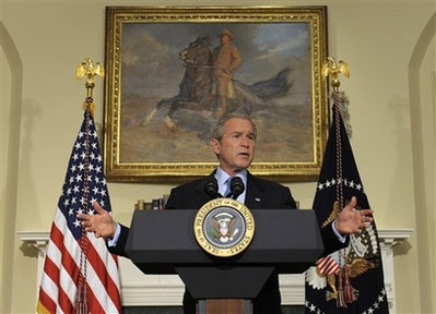 President Bush gestures during a statement on the 10th anniversary of the International Religious Freedom Act, Monday, July 14, 2008, in the Roosevelt Room of the White House in Washington. <br/>(Photo: AP Images / Evan Vucci)