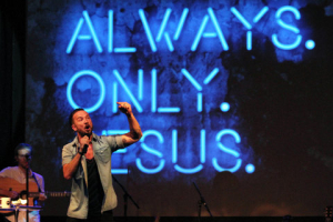 Pastor Carl Lentz leads a Hillsong NYC Church service at Irving Plaza in New York on July 14, 2013. Tina Fineberg/AP <br/>
