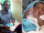 Daniel Wani Holds His Newborn Baby
