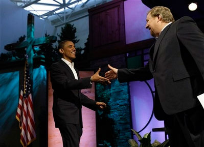 Democratic presidential candidate Sen. Barack Obama, D-Ill., shakes hands with Pastor Rick Warren during the Saddleback Forum in Lake Forrest, Calif. Saturday, Aug. 16, 2008. <br/>(Photo: AP Images / Alex Brandon)