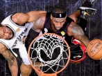 San Antonio Spurs vs. Miami Heat - LeBron James putting the ball in the hoop