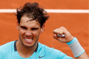 Rafael Nadal celebrates after winning the French Open for the Ninth time.  <br/>AP