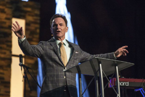 Ronnie Floyd, pastor at Cross Church in Northwest Arkansas, speaks Sunday night at the 2014 Southern Baptist Convention Pastors' Conference in Baltimore. (AP) <br/>