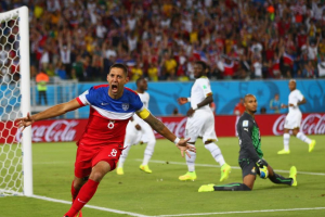 Clint Dempsey celebrates a goal against the Ghana Black Stars during the 2014 World Cup. <br/>