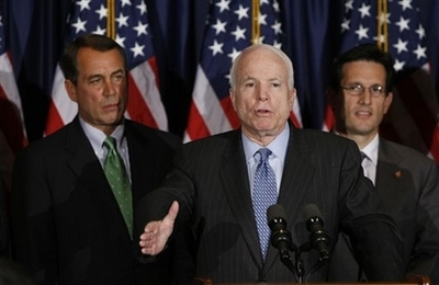 This Wednesday, Feb. 13, 2008 file photo shows Republican presidential hopeful, Sen. John McCain, R-Ariz., center, flanked by House Minority Leader John Boehner of Ohio, left, and Rep. Eric Cantor, R-Va., during a news conference at the Capitol Hill Club in Washington. U.S. Rep. Eric Cantor of Virginia has been asked for 'personal documents' by John McCain's campaign, a Republican knowledgeable with the discussions said Saturday. Cantor, 45, the chief deputy minority whip in the House, has been mentioned among several Republicans as a possible running mate for McCain, the presumptive GOP presidential nominee <br/>(Photo: AP Images / Gerald Herbert, file)
