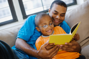 Research shows that children who are read to regularly from a young age perform better academically. (AP) <br/>