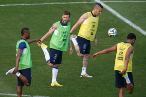 From left, Patrice Evra, Mathieu Debuchy and Yohan Cabaye are all expected to return for France's match against Nigeria. Charles Platiau/Reuters <br/>