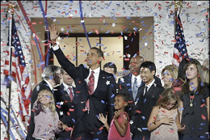 Democratic presidential candidate, Sen. Barack Obama, D-Ill., waves with his family and his running-mate's family after his acceptance speech at the Democratic National Covention at the Invesco Field at Mile High in Denver Thursday, Aug. 28, 2008. <br/>(AP Photo/Alex Brandon)