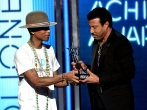 Pharrell presents Lionel Richie with his Lifetime Achievment Award at the BET Awards 2014