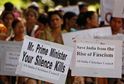Christians and social activists protest against the recent communal violence in the eastern Indian state of Orissa, in New Delhi, India, Friday, Aug. 29, 2008. Pope Benedict XVI condemned anti-Christian violence in India, where at least 11 people were killed in three days of violence as Christians clashed with Hindu mobs attacking churches, shops and homes. <br/>(Photo: AP Images / Saurabh Das)