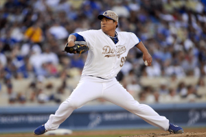 Los Angeles Dodgers starting pitcher Hyun-Jin Ryu throws in the fourth inning of a baseball game against the Cincinnati Reds, Monday, May 26, 2014, in Los Angeles. (AP Photo/Gus Ruelas) <br/>