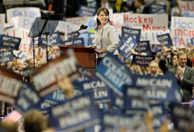 Republican vice presidential candidate Sarah Palin stands amid a sea of celebrating delegates as she addresses the Republican National Convention in St. Paul, Minn., Wednesday, Sept. 3, 2008. <br/>(Photo: AP Images / Charlie Neibergall)