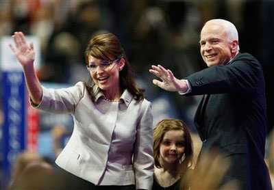 Republican presidential candidate John McCain and his running mate, Sarah Palin, wave after her speech at the Republican National Convention in St. Paul, Minn., Wednesday, Sept. 3, 2008. In the background is Palin's daughter, Piper. <br/>(Photo: AP Images / Charlie Neibergall)
