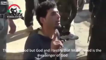 A Christian Syrian man was forced to recant, then beheaded by Islamic militants (Screengrab of Youtube) <br/>