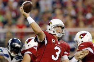 Arizona Cardinals quarterback Carson Palmer (3) throws against the Seattle Seahawks during the first half of an NFL football game, Thursday, Oct. 17, 2013, in Glendale, Ariz. (AP Photo/Ross D. Franklin) <br/>
