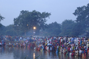 Celebration of Chhath, worship of Sun god, in Bihar, India. (Wikipedia) <br/>