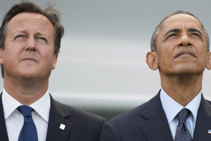 David Cameron, U.K. prime minister, left, and U.S. President Barack Obama at the NATO summit in Wales on Sept. 5, 2014. Photo: Rowan Griffiths/POOL VIA BLOOMBERG <br/>