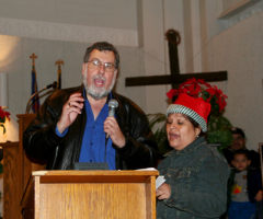Rev. Dr. Jorge deCasanova, director of Hispanic Ministry at Central Union Mission, speaks at the Hispanic Christmas bag event in Washington, D.C. on Saturday, December 23, 2006. <br/>