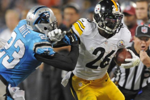 Carolina Panthers' Melvin White (23) tries to tackle Pittsburgh Steelers' Le'Veon Bell (26) during the first half of an NFL football game in Charlotte last week. <br/>AP